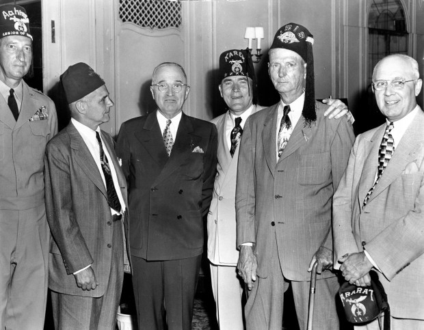 President Harry Truman, third from left, stands with Shrine and Army leaders at a reception at the Stevens Hotel on July 19, 1949, in Chicago. Truman was in town for the Shriners convention, which included a stop at Medinah Temple. (Chicago Tribune historical photo)