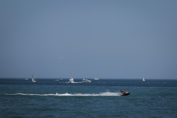 A jet ski flies through the water in the Playpen,...