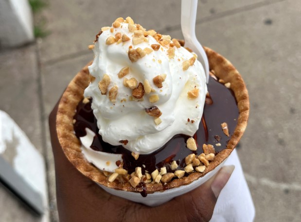 A hot fudge sundae with whipped cream and peanuts from Betty's Ice Cream in the Gage Park neighborhood on July 16, 2025. (Lauryn Azu/Chicago Tribune)