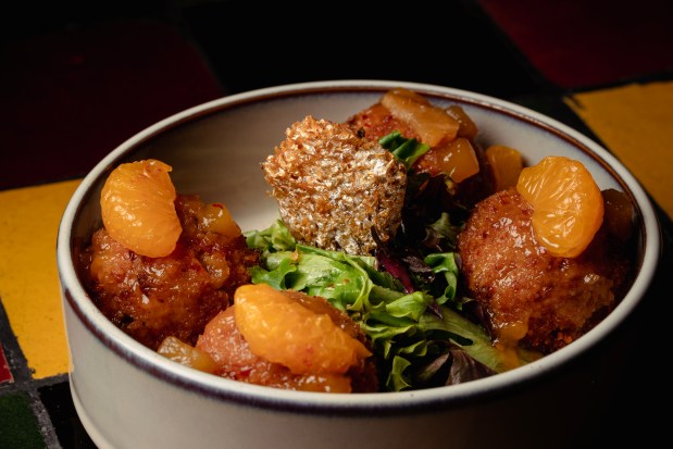 Salmon cala fritters at Mahari. (E. Jason Wambsgans/Chicago Tribune)