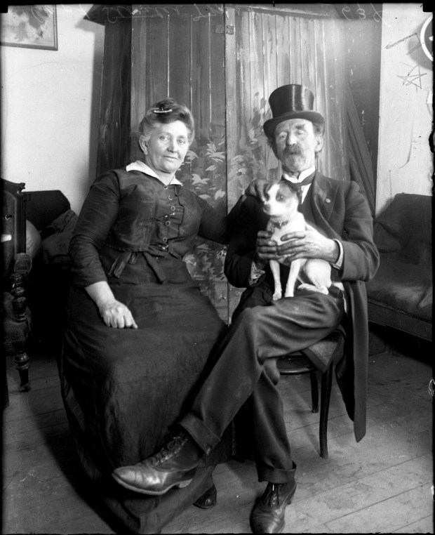 Captain George Wellington Streeter and Ma Streeter with their dog, Spot. In 1921, the Tribune wrote at the time of Streeter's death, "The veteran mariner was photographed wearing the battered silk hat, which was part of his uniform in many battles for the possession of the 'Deestrick of Lake Michigan,' the rich lands east of Lake Shore Drive, where now many of Chicago's wealthiest families live. The 'Cap'n and his dog were almost inseparable." (Chicago Tribune historical photo)
