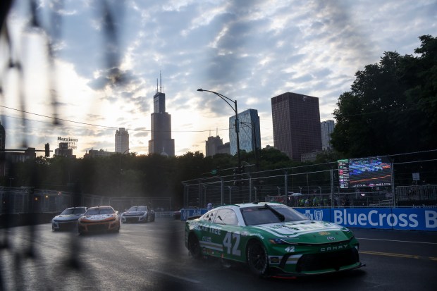Drivers race down Balbo Drive during the NASCAR Chicago Street Race in Grant Park on July 7, 2024. (Eileen T. Meslar/Chicago Tribune)