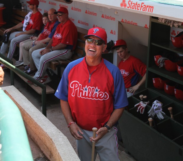 Phillies manager Ryne Sandberg watches from the dugout before a game against the Cubs on Aug. 30, 2013, at Wrigley Field. (Phil Velasquez/Chicago Tribune)