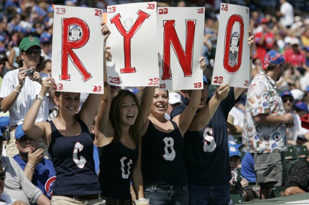 Fans of Hall of Famer Ryne Sandberg show their appreciation before the Cubs retire his No. 23 before a game against the Marlins on Aug. 28, 2005, at Wrigley Field. (José M. Osorio/Chicago Tribune)