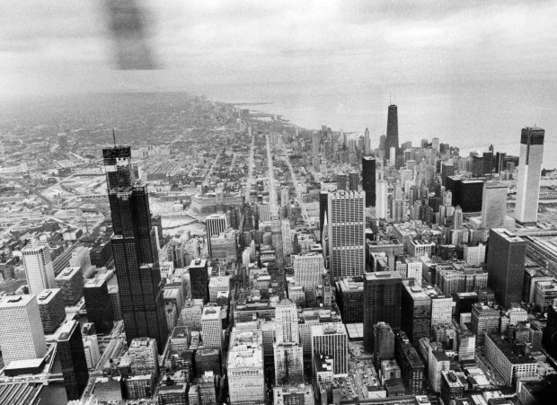 An aerial view of the topping out of the Sears Tower on May 3, 1973, in Chicago. (James O'Leary/Chicago Tribune)