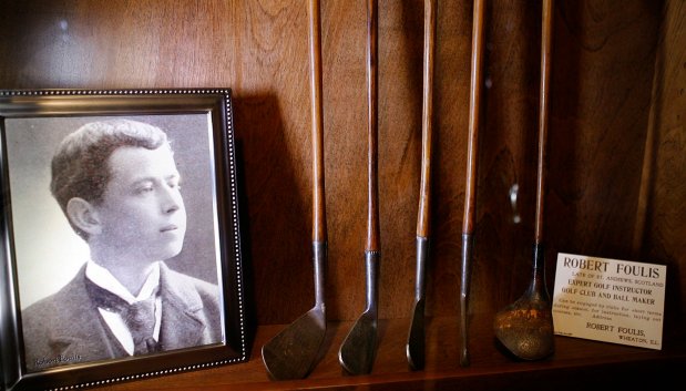 A photo of and golf clubs made by Wheaton resident Robert Foulis, brother of U.S. Open winner James Foulis, on display at an exhibit called "Fairways, Greens & Clubs" at the Wheaton Historic Preservation Council's "Center for History" on Nov. 30, 2006. (George Thompson/Chicago Tribune)