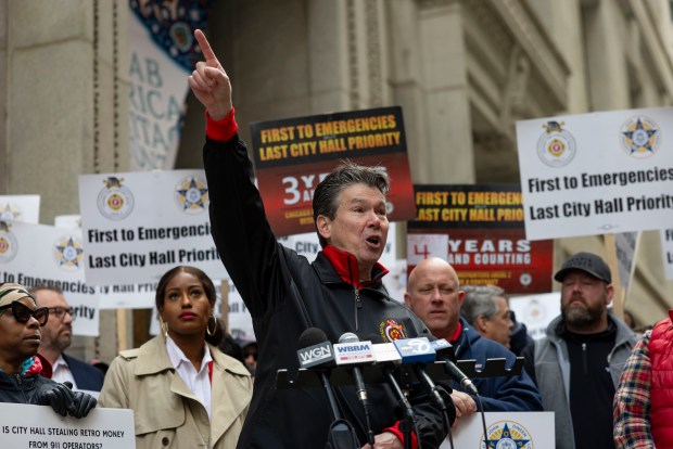 Pat Cleary, president of Chicago Firefighters Union Local 2, speaks at a rally for their new contract, April 16, 2025, outside City Hall. (Brian Cassella/Chicago Tribune)