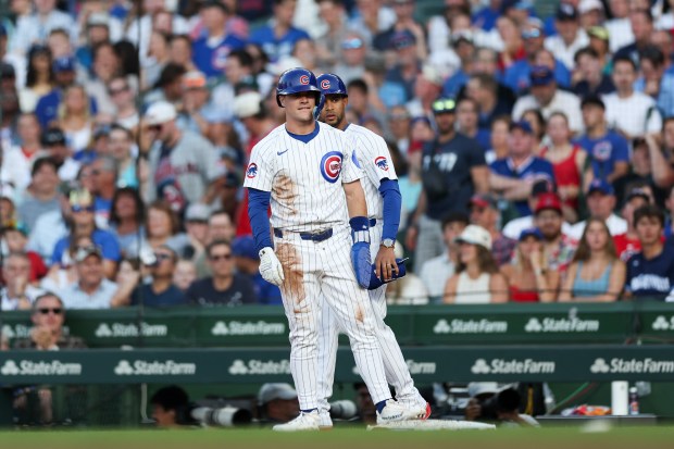 Cubs third baseman Matt Shaw stands at first base after being tagged out during the second inning against the Guardians on Tuesday, July 1, 2025, at Wrigley Field. (Armando L. Sanchez/Chicago Tribune)