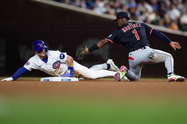 Guardians second baseman Angel Martínez tags out Cubs third baseman Matt Shaw during the seventh inning Tuesday, July 1, 2025, at Wrigley Field. (Armando L. Sanchez/Chicago Tribune)