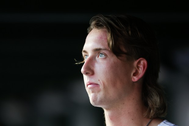 Chicago Cubs pitcher Ben Brown (32) stands in the dugout during the second inning against the Kansas City Royals at Wrigley Field on Monday, July 21, 2025, in Chicago. (Armando L. Sanchez/Chicago Tribune)