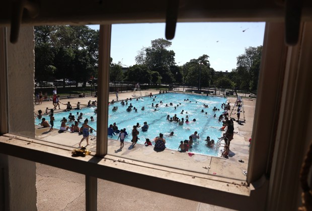 A crowd packs the McKinley Park pool on Chicago’s Southwest...