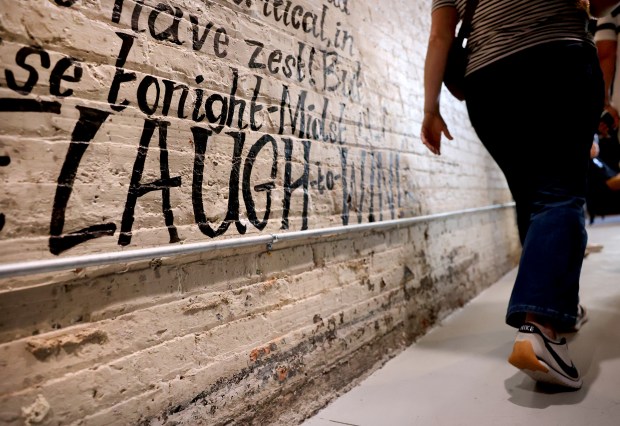 A person exits The Revival improv theater in Chicago’s South...