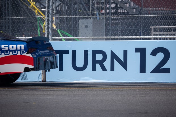 Thompson Pipe Group’s Dean Thompson (26) comes around Turn 12...