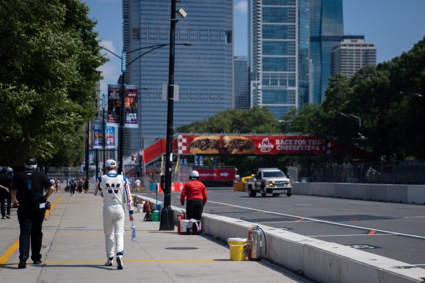 Red Bull/Weather Tech’s Colin Zilisch (88) walks off the track...