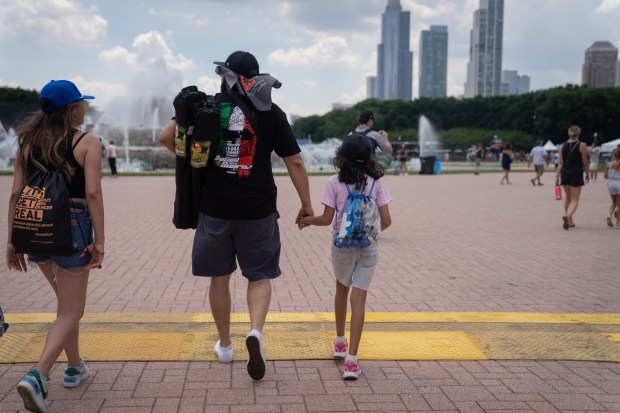 Fans enjoy the atmosphere in Grant Park during the NASCAR...