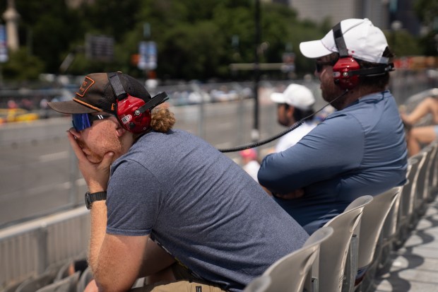 Brothers Cody Alguire and Timothy Alguire watch the Nascar Infinity...
