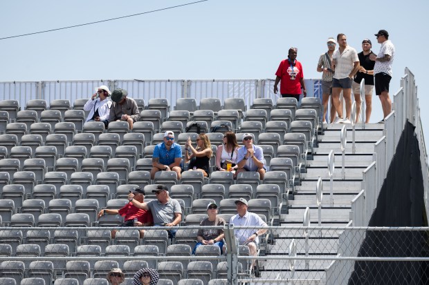 Fans enjoy the atmosphere in Grant Park during the NASCAR...