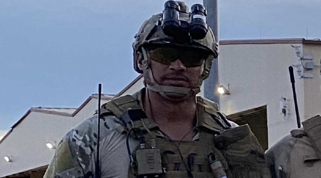 Chris Ferrell wearing night vision goggles