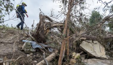 First responders from College Station Fire Department search along the banks of the Guadalupe River, as rescue efforts continue following extreme flooding, Sunday, July 6, 2025, in Ingram, Texas. (AP Photo/Rodolfo Gonzalez)