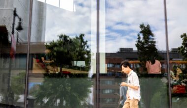 A person walked by the Boston University Duan Family Center for Computing & Data Sciences on Monday, July 7.