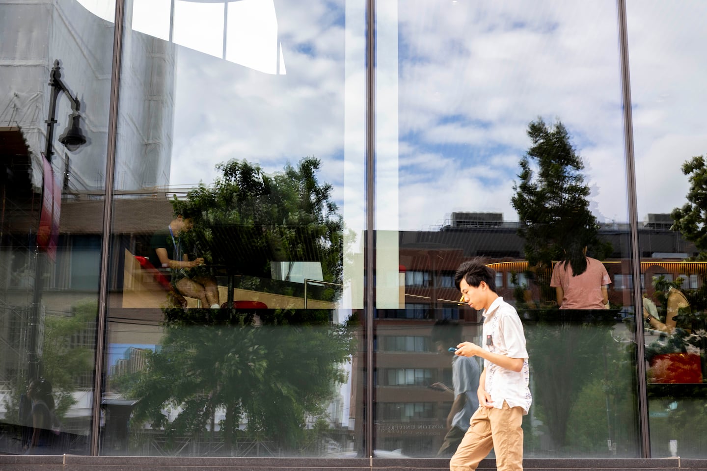 A person walked by the Boston University Duan Family Center for Computing & Data Sciences on Monday, July 7.