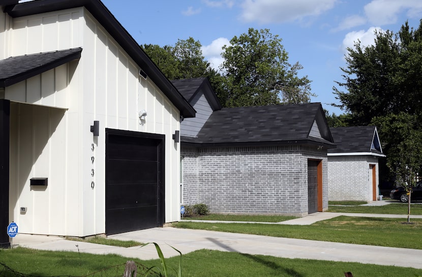 These three recently constructed houses are new additions to the 3900 block of Coolidge...