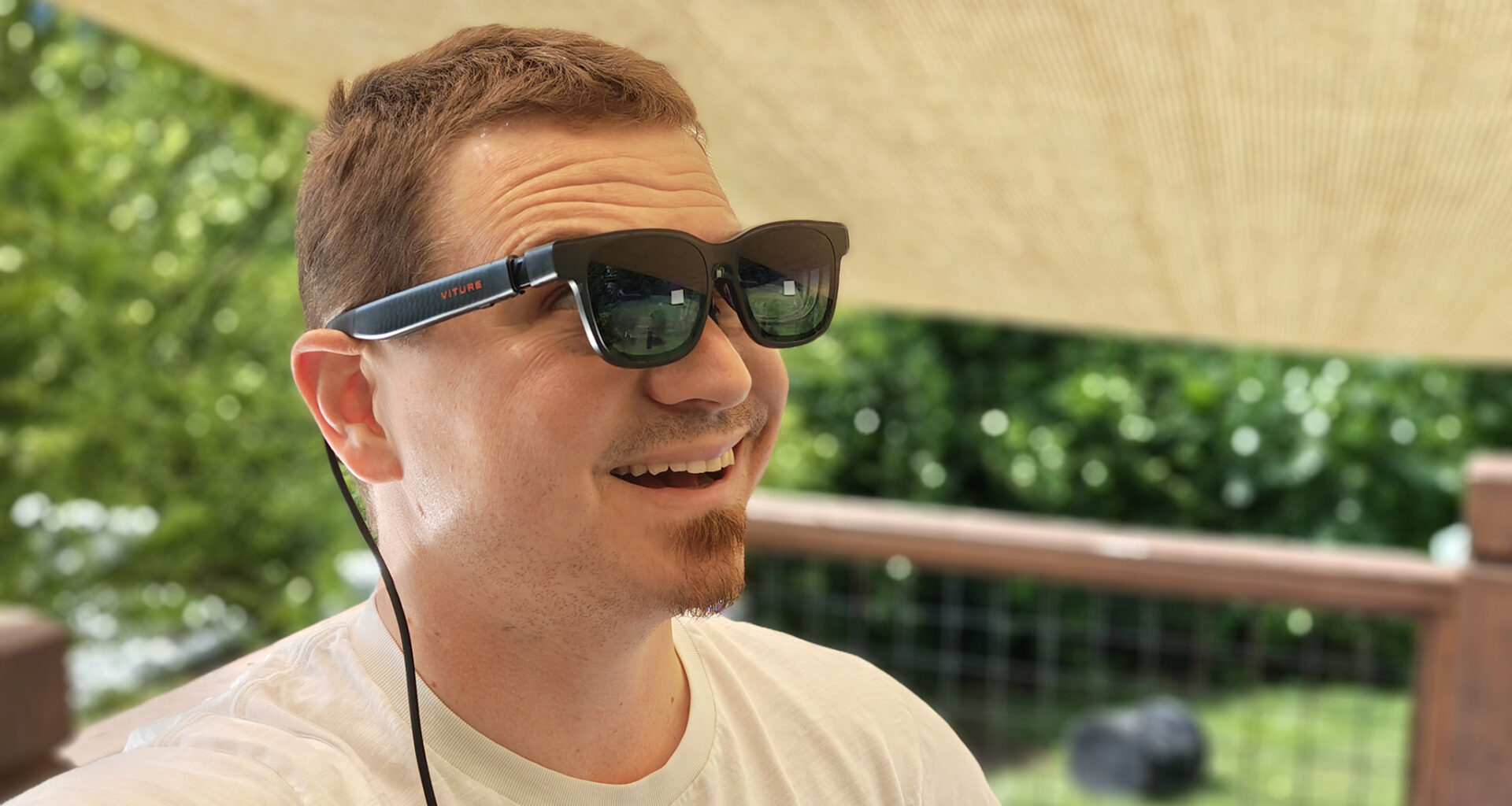 Wearing a pair of Viture Luma Pro glasses while using Spacewalker's Immersive 3D feature