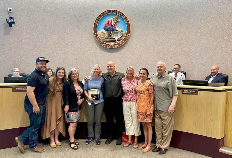 Employee of the Year Cindy Morgan and her family with Supervisor Hall