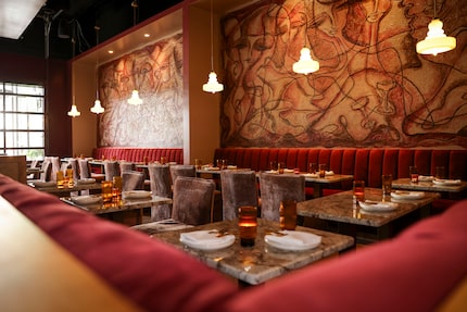 A Picasso inspired mural runs the length of the wall at Flamant in Plano.