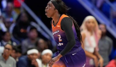 Phoenix Mercury's Kahleah Copper celebrates after sinking a basket in a WNBA game against the Dallas Wings.