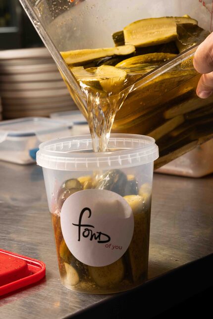 Pickles are packaged at Fond in Dallas on Tuesday, July 15, 2025. 