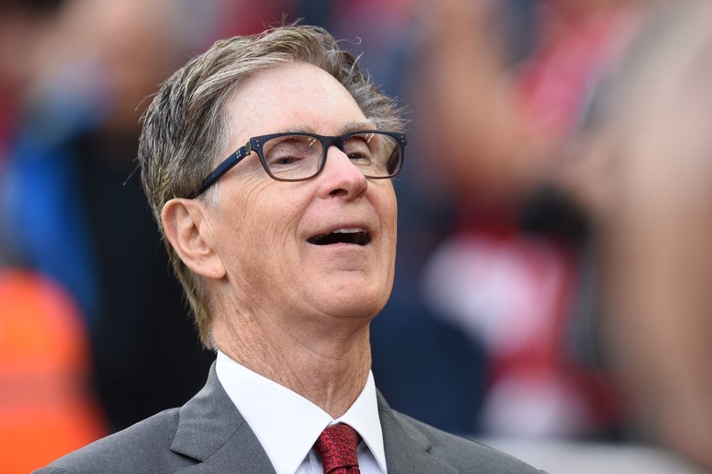 Liverpool and FSG owner John Henry laughs