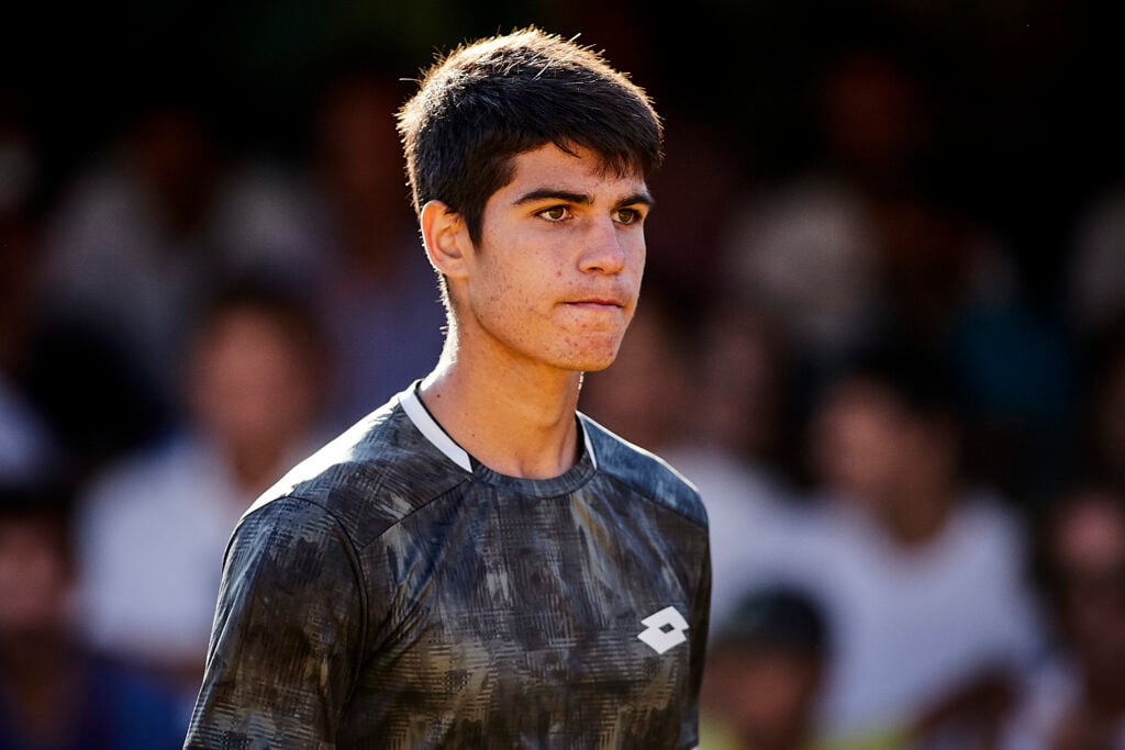 Carlos Alcaraz of Spain looks on during his round of 16 match against Pedro Martinez Portero of Spain on day 3 of ATP Sevilla Challenger at Real Club Tenis Betis.