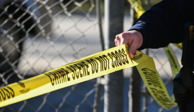 Police tape at a crime scene.