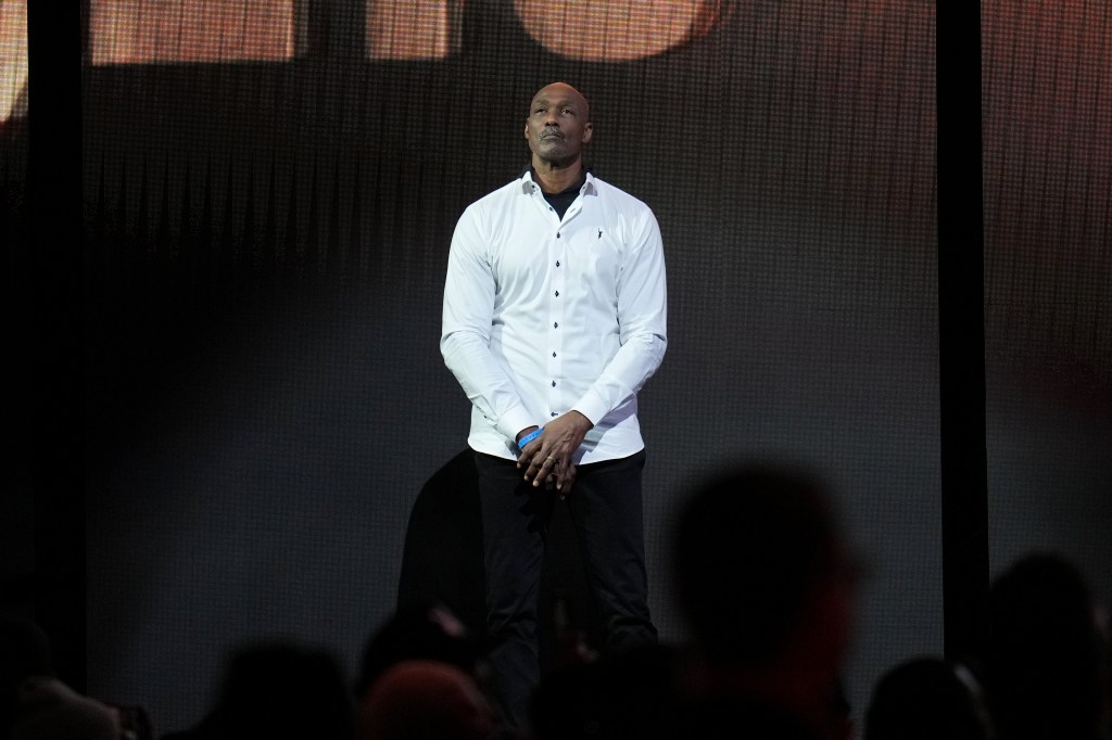 A man in a white shirt at the 2023 NBA All-Star Game.