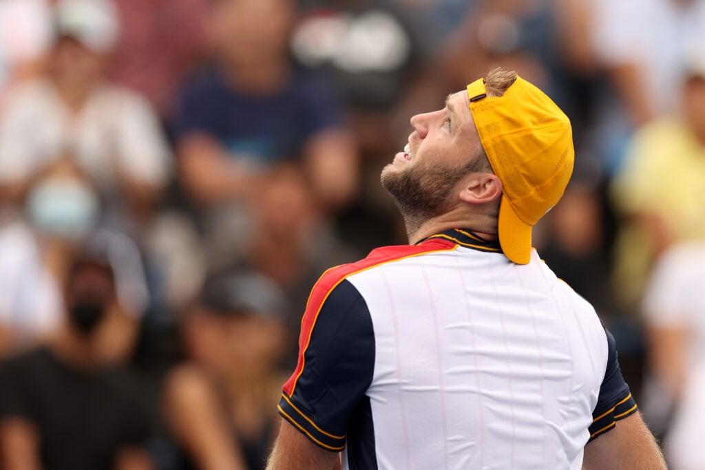 Jack Sock of the United States reacts against Yoshihito Nishioka of Japan during his Men's Singles first round match on Day Two of the 2021 US Open at the Billie Jean King National Tennis Center.