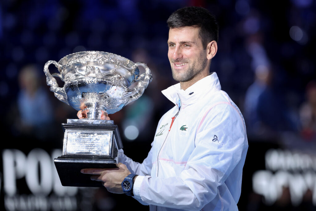 Novak Djokovic of Serbia poses with the Norman Brookes Challenge Cup after winning the Men's Singles Final match against Stefanos Tsitsipas of Greece during day 14 of the 2023 Australian Open at Melbourne Park on January 29, 2023 in Melbourne, Australia.