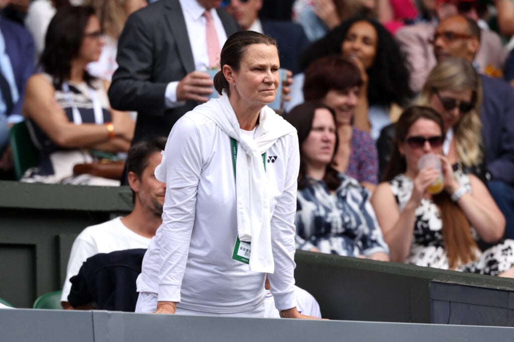 Pam Shriver looks on as Donna Vekic of Croatia plays against Jasmine Paolini of Italy in the Ladies' Singles Semi-Final match during day eleven of The Championships Wimbledon 2024 at All England Lawn Tennis and Croquet Club.