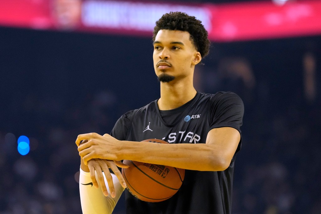 Victor Wembanyama #1 of the San Antonio Spurs and Chuck's Global Stars looks on during 2025 NBA All-Star Practice & Media Availability at Oakland Arena on February 15, 2025 in Oakland, California. 