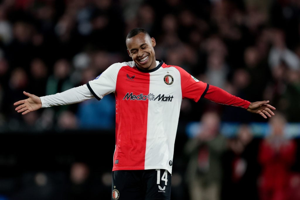 Igor Paixao with arms out in celebrate after scoring for Feyenoord.