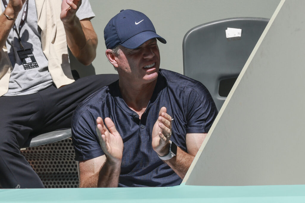 Mark Petchey looks on