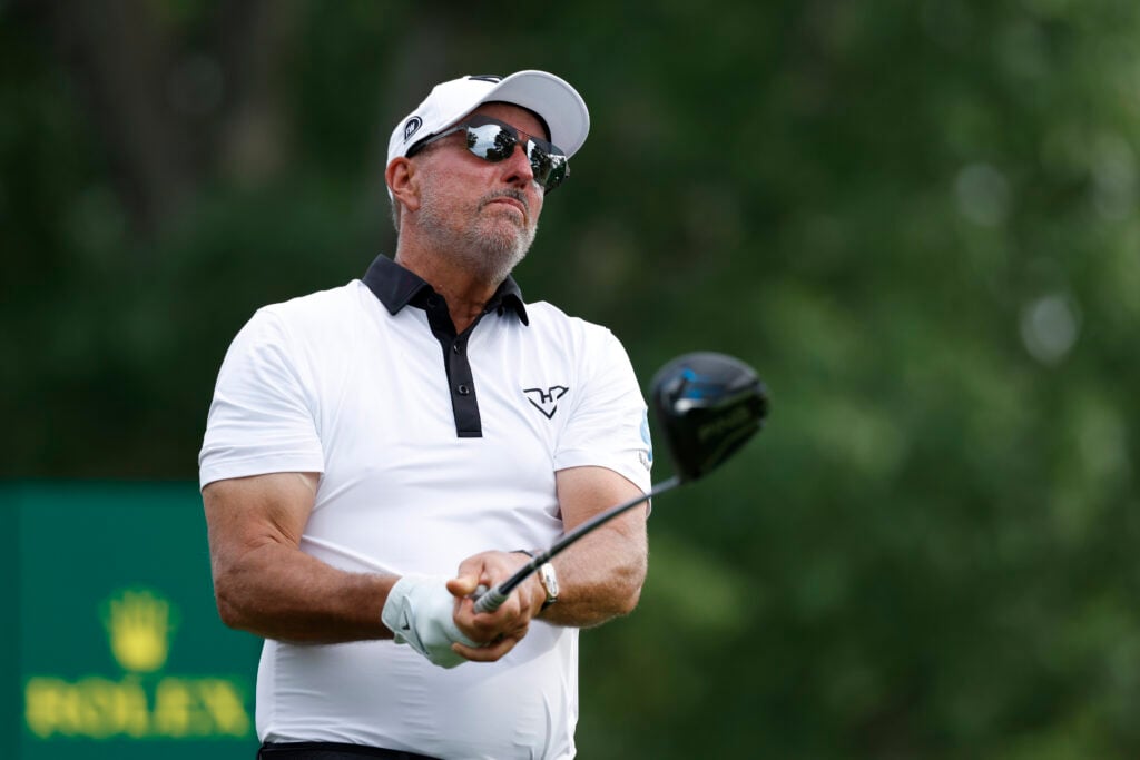 Phil Mickelson hits his tee shot on the 18th hole during the second round of the 2025 PGA Championship