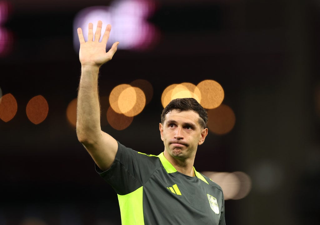 Emiliano Martinez waves goodbye to Aston Villa fans.