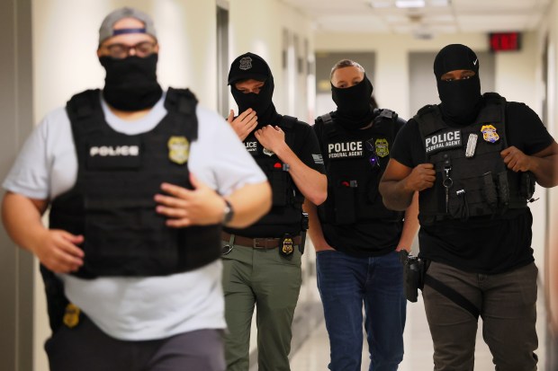Federal agents patrol the halls of immigration court at the Jacob K. Javitz Federal Building on June 18, 2025 in New York City. (Photo by Michael M. Santiago/Getty Images)