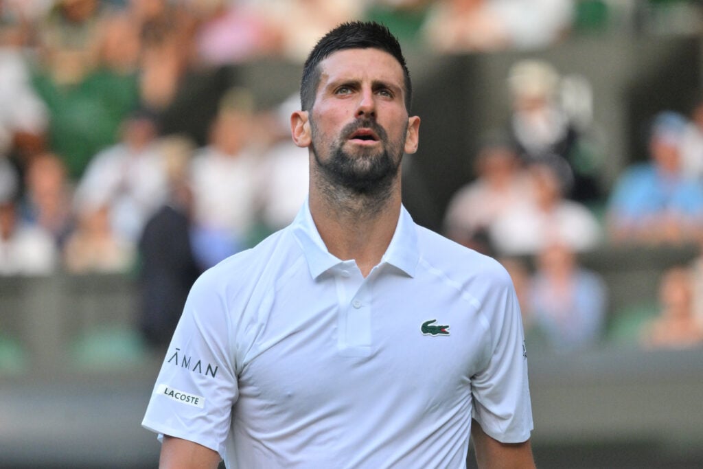 Novak Djokovic of Serbia plays in the Men's singles first round match against Alexandre Muller of France during day one of The Championships Wimbledon 2025 at All England Lawn Tennis and Croquet Club