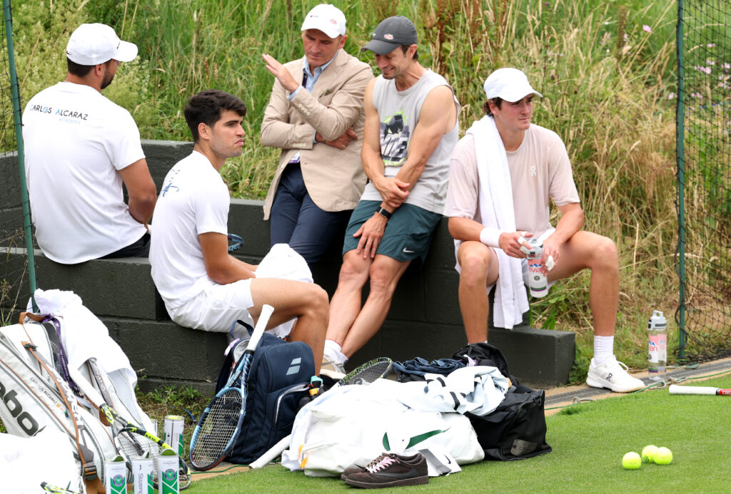 Carlos Alcaraz and Joao Fonseca sit and chat at Wimbledon