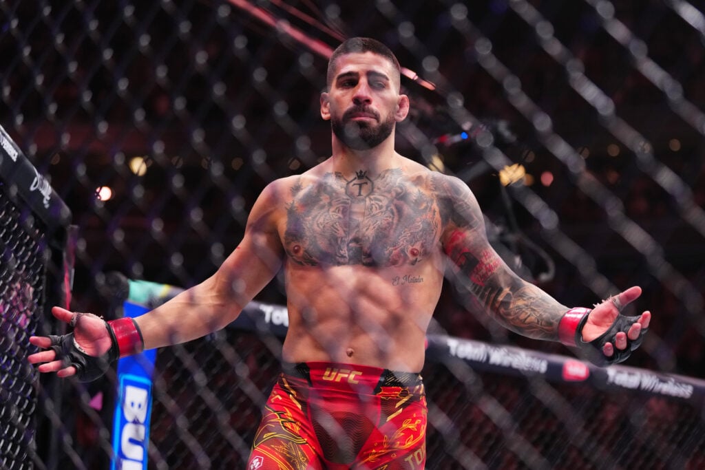 Ilia Topuria reacts after knocking out Charles Oliveira at UFC 317 in Las Vegas