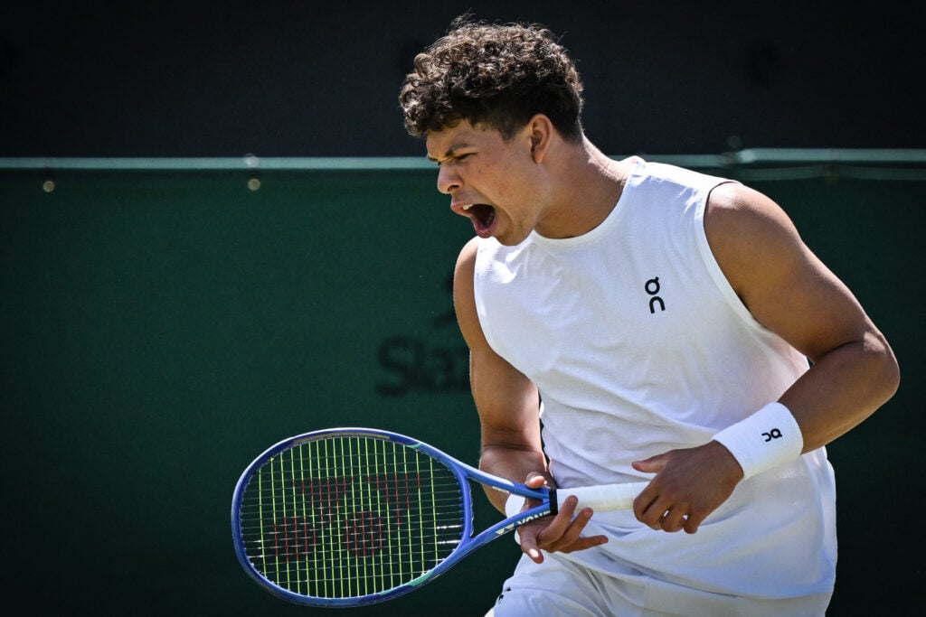 Ben Shelton celebrates in his match with Rinky Hijikata at Wimbledon.