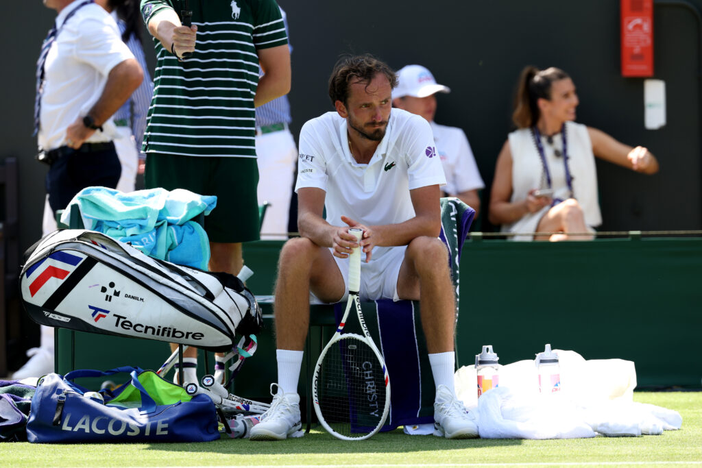 Daniil Medvedev reacts during a break between sets against Benjamin Bonzi of France during the Gentlemen's' Singles first round match on day one of The Championships Wimbledon 2025 at All England Lawn Tennis and Croquet Club on June 30, 2025 in London, England.
