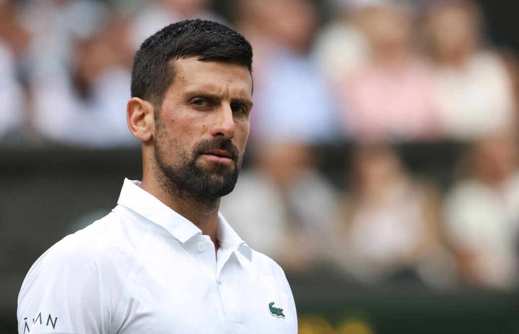 Novak Djokovic looks on during his win over Alex de Minaur at Wimbledon